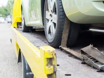 car-transporter-breakdown-lorry-during-working-using-locked-belt-transport-other-green-car