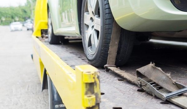 car-transporter-breakdown-lorry-during-working-using-locked-belt-transport-other-green-car